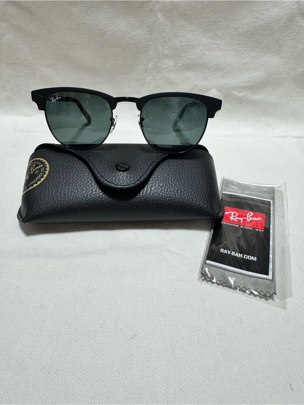 Ray-Ban Black Frame Sunglasses with Green Lenses